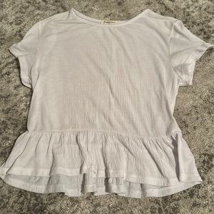 White ruffled shirt
